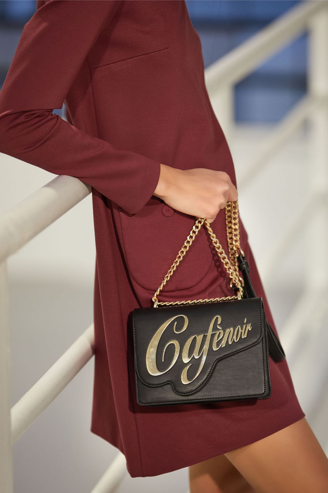 mini bag with shaped flap featuring the cafènoir logo